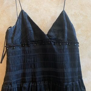 Gorgeous black textured and tiered floorlength gown by Monique Lhuillier